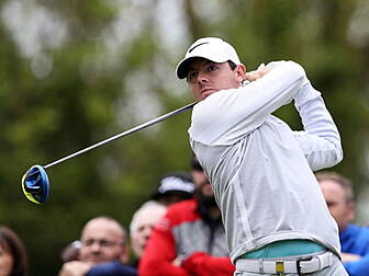 Rory McIlroy keeps pace at the...